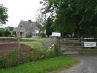 Entrance to the 1866 station at Madderty, Perthshire, on a July day in 2007. The station closed to passengers in 1951, with the Perth - Crieff line closing completely in 1967. View east from the gate towards what is now a substantial private residence.<br><br>[John Furnevel 12/07/2007]