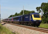 HST 125 43 036 eastbound, passing the long gone station site at Shrivenham on the GWML.<br><br>[Peter Todd 17/06/2017]