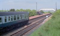 A family group about to board an eastbound DMU at Breich in 1990. The small timber shelter on the eastbound platform is long gone (correction - still there as of 2017). This station originally had a building, typical of the line such as that at Shotts, on the westbound platform.<br><br>[Ewan Crawford //1990]