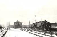 A cold March day at Paisley Gilmour Street in 1955 sees twin Fairburn tanks 42258 and 42259 on a train from Gourock.<br><br>[G H Robin collection by courtesy of the Mitchell Library, Glasgow 21/03/1955]