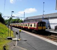 Having arrived at Platform 2 (foreground) then reversed in the stub beyond<br>
the signal, a Glasgow bound Class 314 enters Platform 1 at Neilston on 17th June 2017.<br><br>[David Panton 17/06/2017]