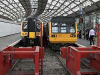 Platforms 8 and 9 at Lime Street in June 2017. Off to the left behind the partition, work has started to construct two new platforms – a mere 8 years or so after new buildings were erected in the former cab road area. The temporary Virgin first class lounge currently situated near the station entrance at least has a toilet, so Liverpool Virgin passengers are spared the inconvenience suffered by those waiting in the lounge at Glasgow Central.<br><br>[Colin McDonald 21/06/2017]