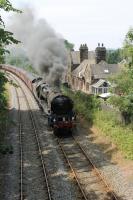 Hauling its first train in over fifty years Merchant Navy 35018 <I>British India Line</I> undertook a loaded test run from Carnforth on 6th July 2017. The ex-Barry 4-6-2 is seen passing Borwick but was 50 minutes late and only managing around 15mph on the climb. Perhaps it was just a dirty fire because after Hellifield it steadily gained time round the circuit and was nearly three hours early back in Carnforth. <br><br>[Mark Bartlett 06/07/2017]