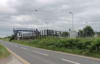 The epitome of <I>Parliamentary services</I>, this is Teesside Airport station, which only has one train calling in each direction per week. Opened in 1971 it once had an hourly service but is some distance from the airport terminal and was little used. In 2016 only 98 passenger journeys were recorded and that was considerably more than many previous years. This view taken from the A67 but the station cannot be accessed from this road.<br><br>[Mark Bartlett 24/06/2017]