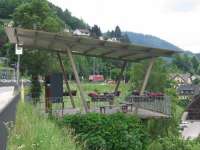 Framed by a Schwarzwaldbahn panoramic viewpoint structure, a light<br>
electric loco hurries through Hornberg in the Black Forest on 3rd June. <br>
<br><br>[David Spaven 03/06/2017]