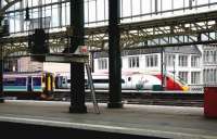 Cross platform view at Glasgow Central in the summer of 2005, with trains for Edinburgh Waverley and London Euston awaiting departure.<br><br>[John Furnevel 30/07/2005]