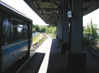 A Wessex Trains DMU for Truro awaits its departure time at Falmouth Docks in the summer of 2002.<br><br>[Ian Dinmore 02/06/2002]