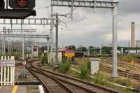 A shot of 66149 hiding in the background at Didcot. <br>
<br>
I was misinformed and told 35028 Clan Line would be departing Didcot today at 1120, heading east. Oops, it left on Friday. I suspect it was enroute to the Mid-Hants Rly, they are having a Gala Weekend to celebrate the end of Southern Steam in 1967. Five Bullieds in steam, who would have thought it?<br><br>[Peter Todd 01/07/2017]