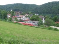 Class 611 tilting diesels are the standard rolling stock on DB's<br>
Donaueschingen-Ulm IRE service, linking the southern Black Forest with the<br>
Schwabische Alb (Schwabian mountain region) to the east. Here a 2-car<br>
service accelerates away from the village of Beuron on 6th June 2017. The tower<br>
of the local Benedictine monastery, where the photographer stayed for a week<br>
(highly recommended for a peaceful holiday), can be glimpsed in the<br>
background. The Class 611s are concentrated in south west Germany, based at<br>
Tuebingen. [With thanks to Bill Jamieson for loco intelligence]<br>
<br><br>[David Spaven 06/06/2017]