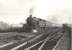 A Glasgow Queen Street - Kirkintilloch local runs through Cowlairs West Junction on 3 April 1956. The train is hauled by Eastfield's Gresley V3 2-6-2T no 67600.<br><br>[G H Robin collection by courtesy of the Mitchell Library, Glasgow 03/04/1956]