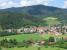 A southbound Schwarzwaldbahn train passes through classic Black Forest scenery by the village of Gutach, en route from Karlsruhe to Konstanz, on 2nd June 2017. Gutach is the home of the Bollenhut, a traditional womens' hat topped with pom-poms, which is a symbol for the Black Forest as a whole.<br><br>[David Spaven 02/06/2017]