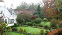 Remains of Tongland viaduct on the north bank of the River Dee on 18 November 2005. The surviving arched section of the approach viaduct now forms an unusual and interesting garden wall.<br><br>[John Furnevel 18/11/2005]