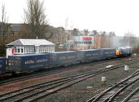 Grangemouth - Aberdeen WHM containers passing Stirling North box in January 2005.<br><br>[John Furnevel 22/01/2005]