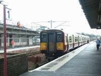 Work in progress on the building occupying platform 2 on the north side of Lanark station in March 2003. A train for Dalmuir is awaiting its departure time at platform 1. <br><br>[John Furnevel 16/03/2003]