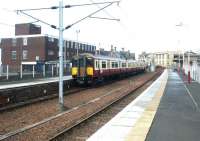 Looking towards the buffer stops at Lanark terminus in March 2003, with a Dalmuir train standing at platform 1.<br><br>[John Furnevel 16/03/2003]