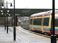 A Newcraighall - Dunblane train about to leave Stirling on 29 January 2005. Stirling North signal box stands on the other side of the overbridge.<br><br>[John Furnevel 29/01/2005]