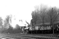 Shunting at the British Aluminium Company's works, Burntisland, in 1971. The hard working locomotive is BAC 0-4-0ST No 1 (Pecket 1376/1915), now preserved at the Caledonian Railway centre, Brechin.<br><br>[John Furnevel 23/03/1971]