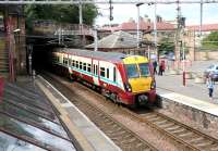 A Gourock - Glasgow Central service arriving at Greenock Central in July 2005.<br><br>[John Furnevel 29/07/2005]