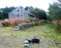 The abandoned former station at Grantown-on-Spey East. View north east along the trackbed towards Craigellachie in September 2004.<br><br>[John Furnevel 17/09/2004]
