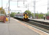 An afternoon Motherwell - Cumbernauld service pulls into Coatbridge Central on 9 May 2005.<br><br>[John Furnevel 09/05/2005]