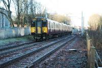 A Larkhall service from Dalmuir enters the passing loop to the south of Ferniegair.<br><br>[Ewan Crawford 12/12/2005]