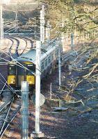 A Dalmuir bound train joins the Hamilton Branch Extension (Hamilton West - Ross Junction) at Haughhead Junction.<br><br>[Ewan Crawford 12/12/2005]