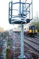 Passing south a train from Dalmuir heads for Larkhall.<br><br>[Ewan Crawford 12/12/2005]