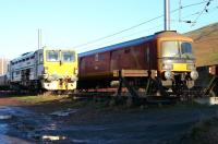 The down sidings at Abington on Christmas Eve 2005. View north with Royal Mail unit 325005 keeping company with First Engineering Tamper DR 73916.<br><br>[John Furnevel 24/12/2005]