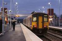 With passengers boarded, the 0658 to Manchester Victoria is the first train to depart from the new station at Buckshaw Parkway on 3 October 2011.<br><br>[John McIntyre 03/10/2011]