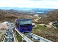 Railcars about to pass on the scenic Cairngorm Mountain Funicular Railway on a crisp and pleasant day in the Autumn of 2004.<br><br>[John Furnevel 13/09/2004]