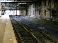 Track lifting continues on a desolate looking north side at Waverley on 22 January 2006, with the crossover and platform 19 bypass line recently removed.<br><br>[John Furnevel 22/01/2006]