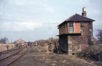 Crab 2-6-0 42737 with Scottish Rambler No 3 at Dalserf on 29 March 1964. The special would continue on this leg of its journey as far as Swinhill before returning to Motherwell. The abandoned trackbed on the right is the original route to Coalburn via Tillietudlem.<br><br>[John Robin 29/03/1964]