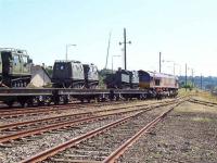 EWS train with army vehicles on flatbeds at Montrose.<br><br>[Mick Golightly 2/08/2005]