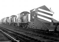 What could be mistaken for a super snowplough in the sidings alongside Haymarket depot on 25 January 1970. The locomotives are, front to rear, 8580, 8615, 8614 and 6850.<br><br>[John Furnevel 25/01/1970]