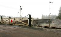 The station remains at Holywood, Dumfriesshire (closed 1949). Looking south from the level crossing in January 2006.<br><br>[John Furnevel 31/01/2006]