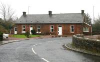 The road approach to the original Gretna Green station, now a private house, in February 2006. The 1852 station was finally closed in 1965, while the current station, 100 yards off to the right, was opened in 1993. [See image 6724]<br><br>[John Furnevel 12/02/2006]