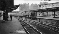 70035 enters Carlisle from Aberdeen.<br><br>[John Robin 27/06/1964]