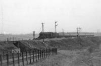 45016 with northbound train at Greenhill as seen from Bonnybridge line.<br><br>[John Robin 30/03/1964]