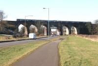 A Glasgow - Edinburgh train crossing the A89 on the western section of the Almond Viaduct in March 2006.<br><br>[John Furnevel 12/03/2006]