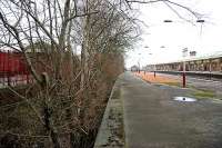 The abandoned and overgrown through platform on the north side of Kilmarnock station. 2006.<br><br>[John Furnevel 27/03/2006]