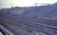 A view of the roughcastle opencast loading pad, near Falkirk, seen from a passing eastbound train in June 1989. In 2011 this remains in place, but overgrown.<br><br>[Ewan Crawford 12/06/1989]