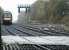 Westbound train just after crossing the Greenfoot Level Crossing.<br><br>[Ewan Crawford //2005]