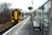 Bathgate service enters Uphall. To the left is the M8 and the remains of an shale oilworks beyond.<br><br>[Ewan Crawford //]