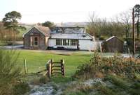 A cold and frosty November morning at Kirkgunzeon, between Dumfries and Dalbeattie, in 2005. View is south east, with part of the platform still visible. Kirkgunzeon station closed to passengers in January 1950.  <br><br>[John Furnevel 09/11/2005]