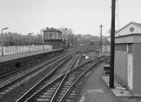 Looking north at Kirkcaldy. An 08 is in the yard along with grain hoppers for the Harbour branch.  The siding on the right leads to the goods shed and a ground frame awaits installation when the 'box is abolished. Sidings on both sides of the main line have been replaced by car parks.<br><br>[Bill Roberton //1981]