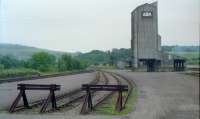 The extensive yard and grain silos at Dufftown in 1989. At the time the line was in limbo - no regular traffic but not closed. Just the occasional visit by 'The Northern Belle'.<br><br>[Ewan Crawford //1989]