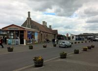 Minehead station is fine and traditional, but the recently built Turntable Café (right) is an acquired taste. The silver 1997 Vauxhall Corsa is arguably as well preserved as the station.<br><br>[Ken Strachan 13/05/2017]