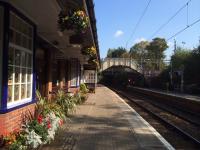 This view, from 2014, shows off the attractive Edwardian station building at Whitecraigs. The view is towards Glasgow.<br><br>[Peter Mckinlay //2014]