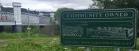 A side view of the community owned Logierait Viaduct and sign showing its website <a target=external href=http://www.logieraitbridge.com>www.logieraitbridge.com</a>.<br><br>[John Yellowlees 01/07/2017]