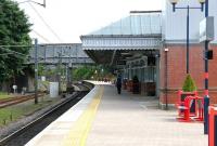 A quiet period at Berwick station on a July morning in 2005. View is north along platform 2 towards Edinburgh. The station was rebuilt by the LNER in 1927.<br><br>[John Furnevel 05/07/2005]